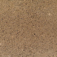Texture background of composite stones similar to brown granite with black, grey and white elements