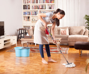 woman cleaning home daily routine