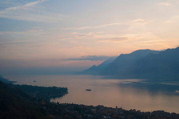 Scenic view of sunset at Lake Garda in the evening, Veneto, Italy. Panoramic view at Lake Garda landscape from top of the Monte Baldo
