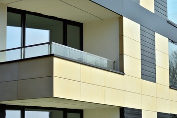 Fragment of a modern apartment building in front. Very modern apartment house.