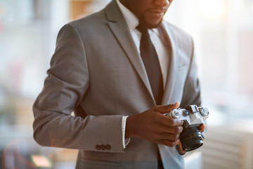 Businessman with photocamera