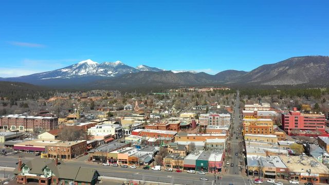 Aerial video Flagstaff AZ with mountain range scene
