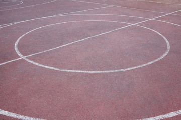 marking on a outdoors basketball court