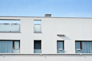Fragment of a modern apartment building in front. Very modern apartment house.