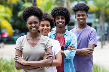 Group of african american young adults in line