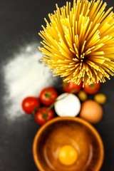 Spaghetti on black background. Traditional Italian food. Dietary food. Pasta on black background. Healthy food.