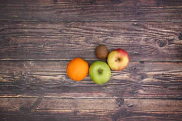 Healthy life - Fruits and vegetables on wooden background