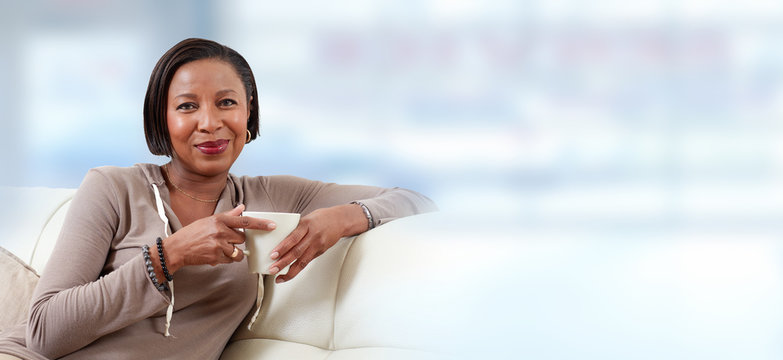 African-American woman drinking tea.
