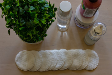 Rome Italy. Cosmetic products used to improve physical appearance. Background with seedling and moment of relaxation.