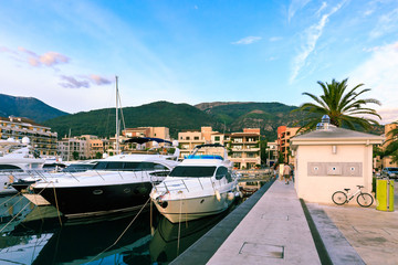 Fototapeta na wymiar Luxury yacht marina. Waterfront of Tivat, Porto Montenegro in Bay of Kotor.