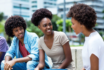 Group of talking african american young adults