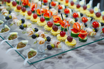 various snacks laid out on a buffet table