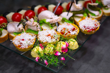 various snacks laid out on a buffet table