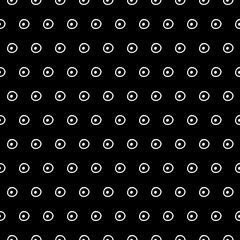 Abstract doodle pattern with hand drawn polka dots. Cute vector black and white doodle pattern. Seamless monochrome doodle pattern for fabric, wallpapers, wrapping paper, cards and web backgrounds.