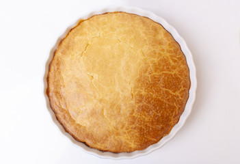 Tasty homemade pie on white background