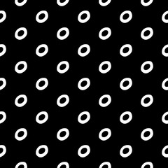 Abstract polka dot pattern with hand drawn dots. Cute vector black and white polka dot pattern. Seamless monochrome polka dot pattern for fabric, wallpapers, wrapping paper, cards and web backgrounds.