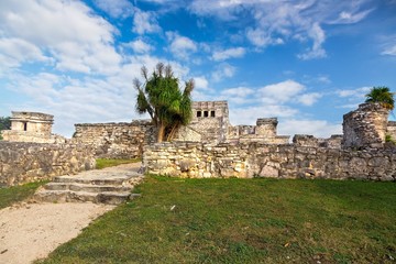 Fototapeta na wymiar Ancient Mayan Ruins Citadel above Caribbean Sea near City of Tulum Archeological Site on Mexico Yucatan Peninsula