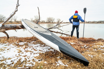 Stand up paddleboard in early spring