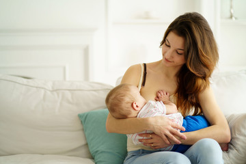 breastfeed, motherhood, Mothers day, family love. mom breastfeeding her little son. breast feeding,...