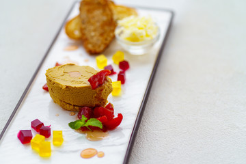 appetizer, healthy breakfast, chicken liver pate served with butter and toasts. delicious and nourishing snack
