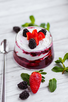 Strawberry And Blackberry Trifle, Appetizing Cold Dessert Of Sponge Cake And Berries Covered With Layers Of Custard, Syrup And Fruits.