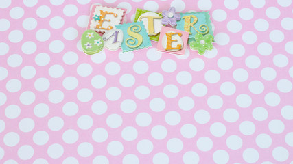 Easter banner on white polka dotted background with writing space