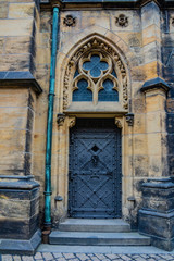 Fototapeta na wymiar Antique door in the in the Prague Castle grounds. Czech Republic, Europe