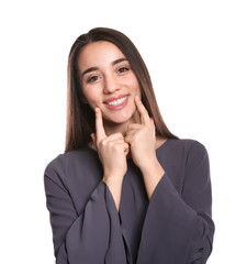 Fototapeta premium Woman showing LAUGH gesture in sign language on white background