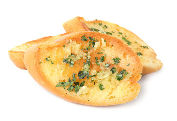 Slices of tasty garlic bread with herbs isolated on white