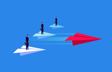 Leadership business concept, red paper plane leading businessman flying