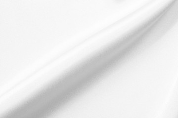 The texture of the satin fabric of white color for the background 