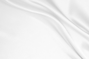 The texture of the satin fabric of white color for the background 