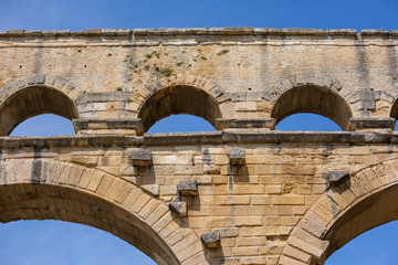 The magnificent three tiered Pont Du Gard aqueduct was constructed by Roman engineers in the 1st...