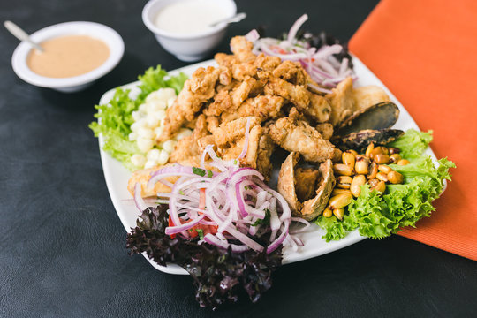 Mixed jelly with peruvian sauce and garlic sauce