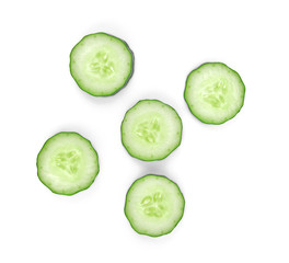 Fresh cucumber slices isolated on white background, top view