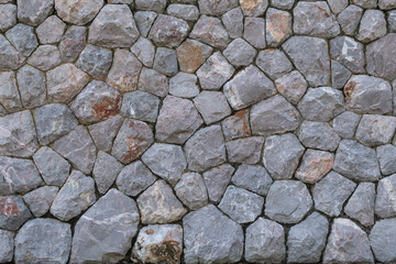 the seamless rock stone wall texture.