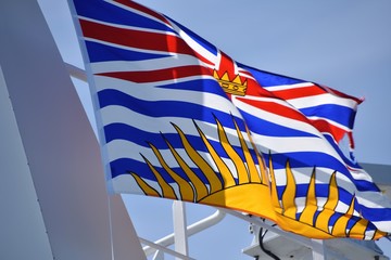 ブリティッシュコロンビア州の旗　Flag of British Columbia province Canada     Waving in the sky