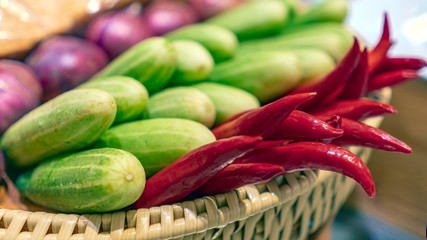Vegetable composition with red hot chili, green zucchini 