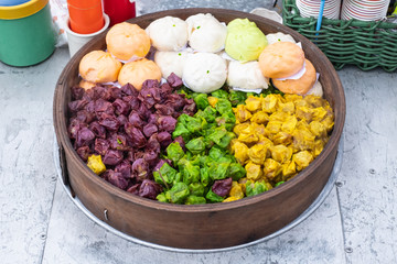Dim Sum Dumpling and buns in the tray, Various types of dumplings and buns in market.