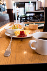 Omelette/salad/bread and coffee - moment of breakfast at cafe in the morning in Tokyo, Japan