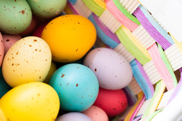 Painted Easter Eggs in brightly colored basket