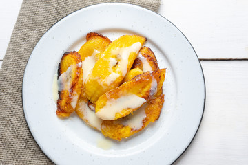 Sweet fried plantain with condensed milk