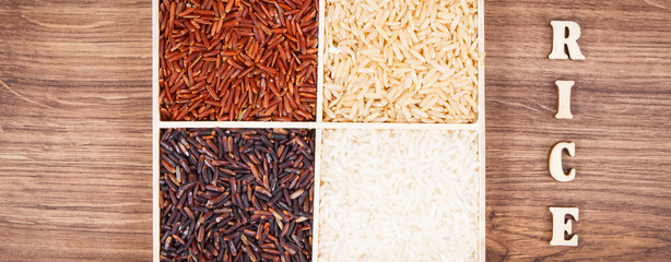 White, brown, black and red rice with inscription, healthy, gluten free nutrition concept