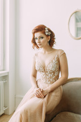 The bride in the interior Studio in the style of fine art. Wedding photo shoot in European style.