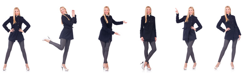 Beautiful woman in black coat isolated on white 