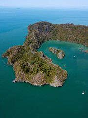 Aerial view of lonely islands in sea. Park Kilim Geforest, Langkawi, Malaysia.
