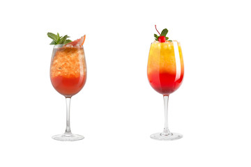 Alcohol cocktail with mint, fruit and berries on a white background. A set of two cocktails in...