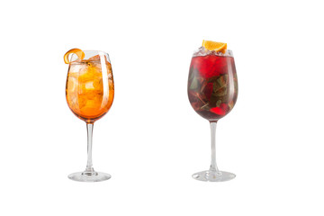 Alcohol cocktail with mint, fruit and berries on a white background. A set of two cocktails in glass goblets on a long leg.