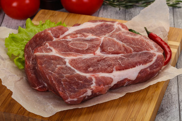 Raw pork neck steak