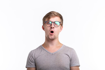 People and emotions concept - Shocked surprised man with open mouth over white background